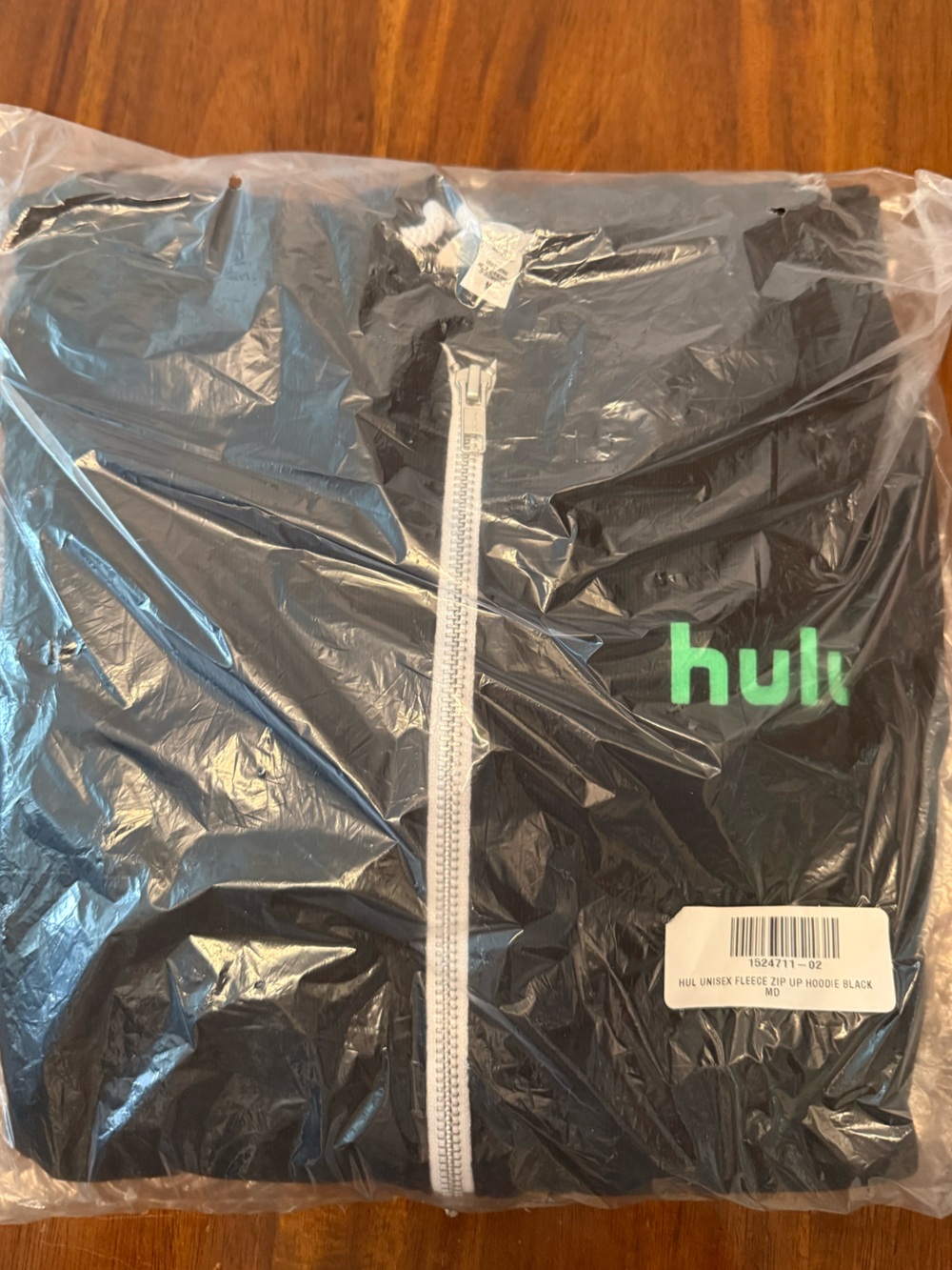 HULU NWT Zip Up Sweatshirt, Size Medium, Excellent Condition! New in Plastic